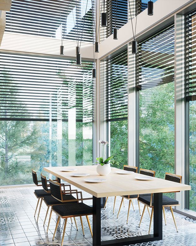 Exterior Venetian blinds controlling sunlight on a modern window facade